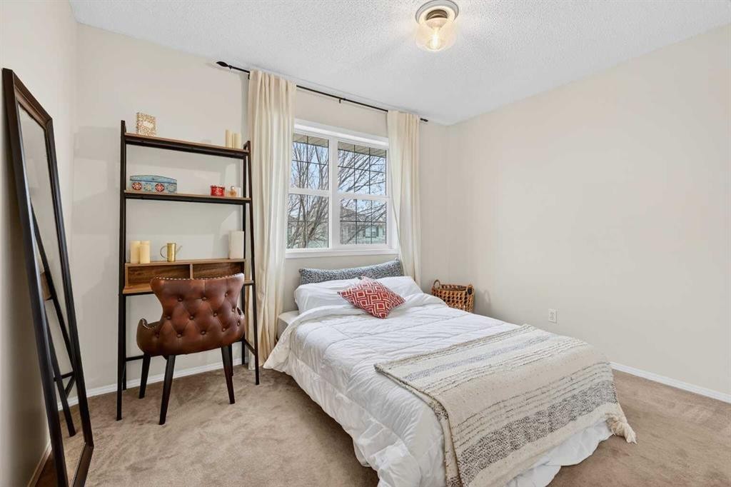 60 Inverness Drive Se, Calgary, AB - Indoor Photo Showing Bedroom