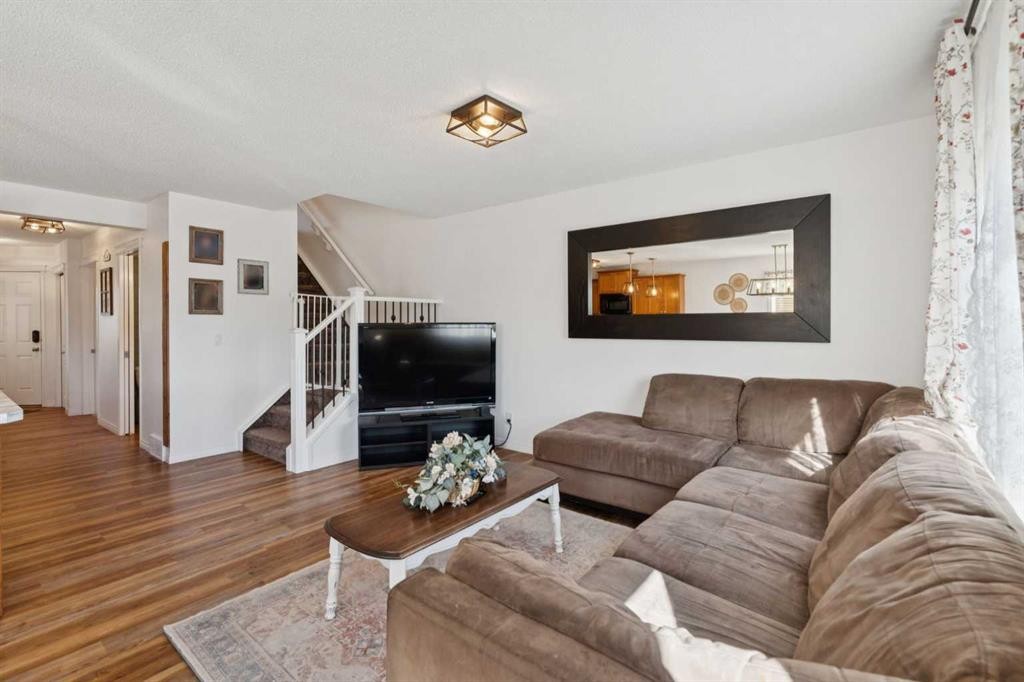 144 Canals Circle Sw, Airdrie, AB - Indoor Photo Showing Living Room