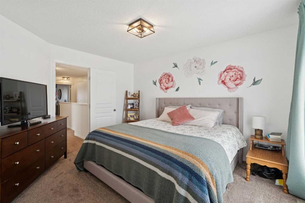 144 Canals Circle Sw, Airdrie, AB - Indoor Photo Showing Bedroom