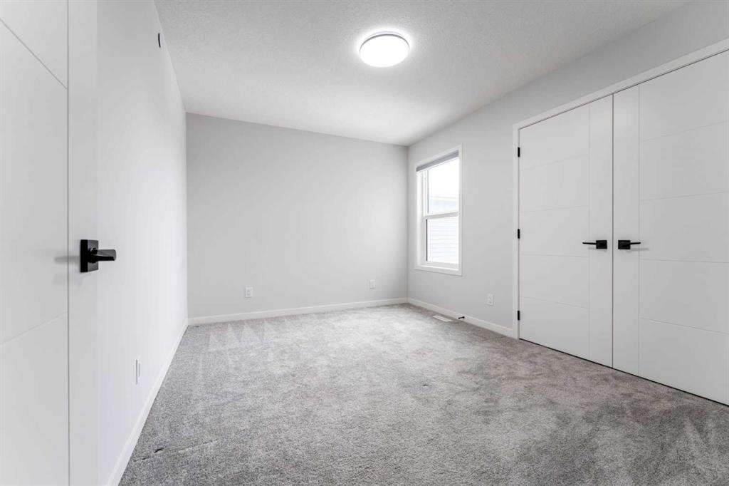 13 Calhoun Crescent Ne, Calgary, AB - Indoor Photo Showing Other Room