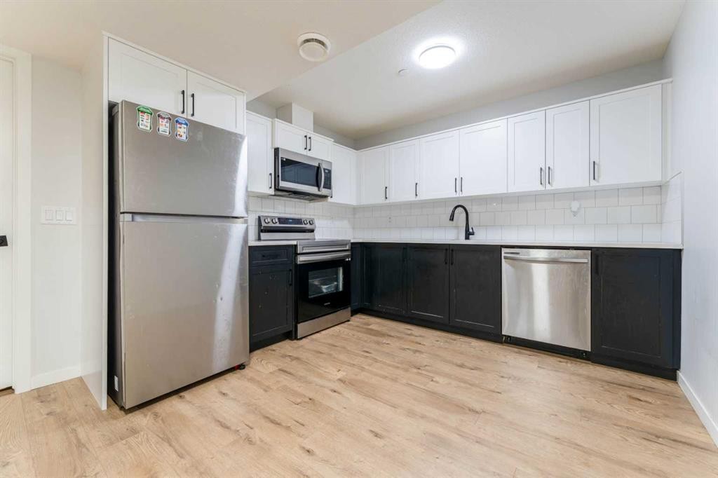 13 Calhoun Crescent Ne, Calgary, AB - Indoor Photo Showing Kitchen With Stainless Steel Kitchen
