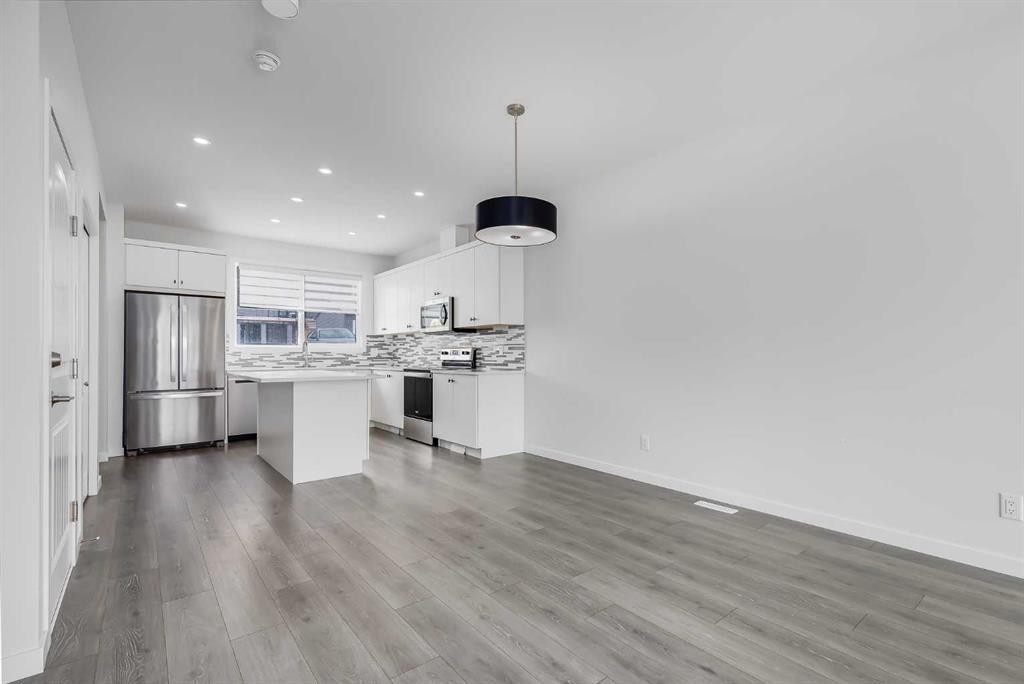 111 Marmot Way Nw, Calgary, AB - Indoor Photo Showing Kitchen With Stainless Steel Kitchen With Upgraded Kitchen