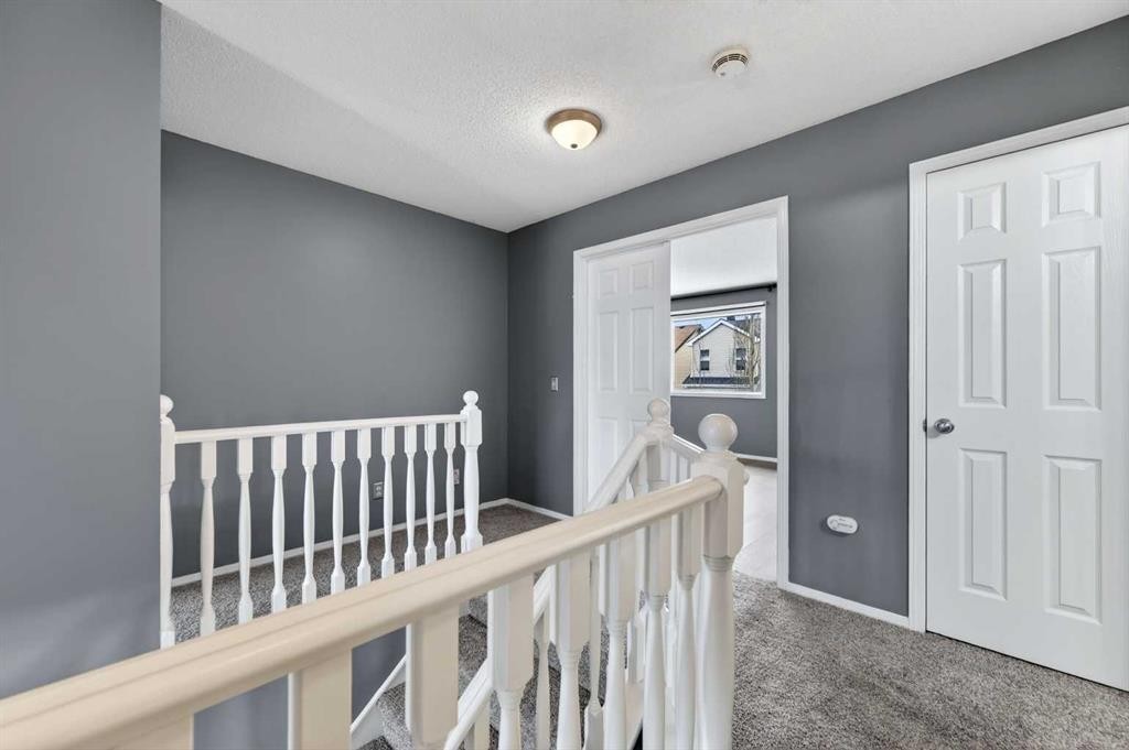 99 Evansbrooke Manor Nw, Calgary, AB - Indoor Photo Showing Other Room