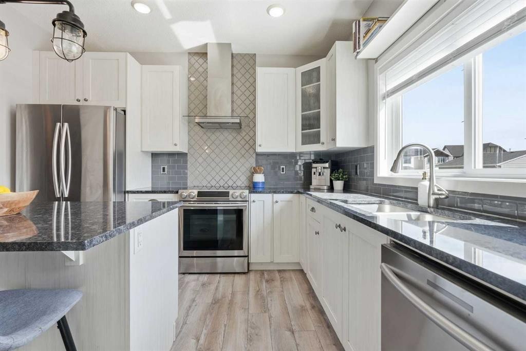 45 Copperpond Avenue Se, Calgary, AB - Indoor Photo Showing Kitchen With Stainless Steel Kitchen With Upgraded Kitchen
