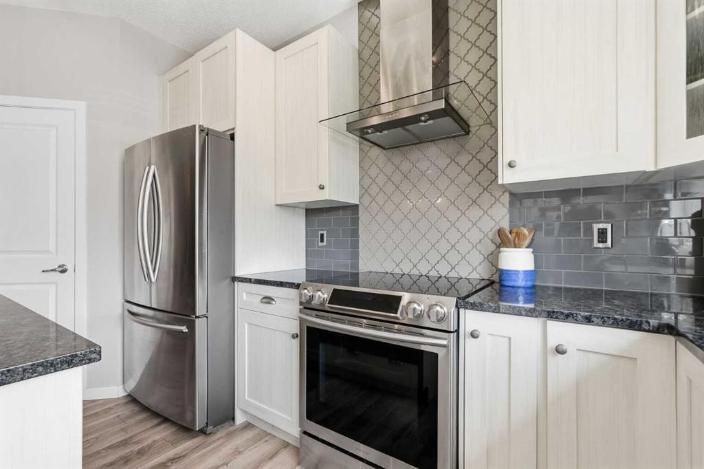 45 Copperpond Avenue Se, Calgary, AB - Indoor Photo Showing Kitchen With Stainless Steel Kitchen