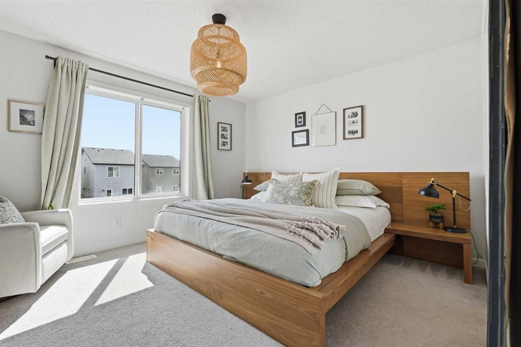 45 Copperpond Avenue Se, Calgary, AB - Indoor Photo Showing Bedroom