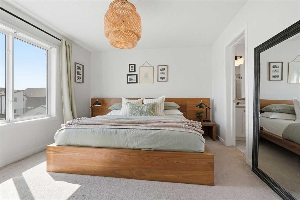 45 Copperpond Avenue Se, Calgary, AB - Indoor Photo Showing Bedroom