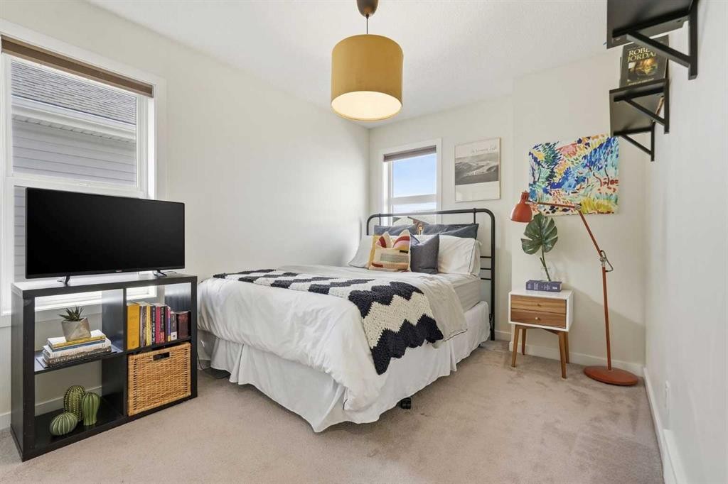 45 Copperpond Avenue Se, Calgary, AB - Indoor Photo Showing Bedroom