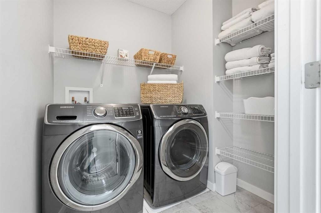 45 Copperpond Avenue Se, Calgary, AB - Indoor Photo Showing Laundry Room