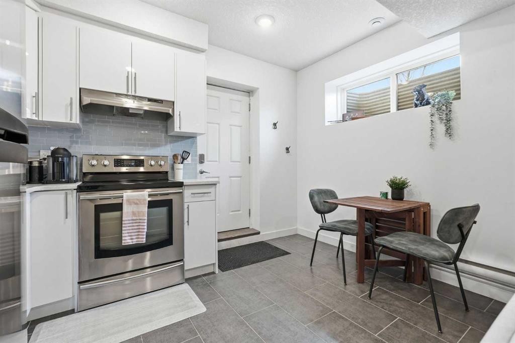45 Copperpond Avenue Se, Calgary, AB - Indoor Photo Showing Kitchen With Stainless Steel Kitchen