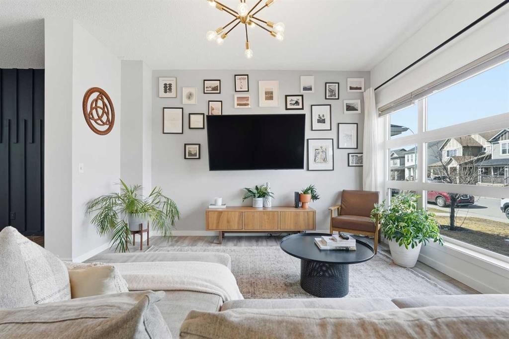 45 Copperpond Avenue Se, Calgary, AB - Indoor Photo Showing Living Room