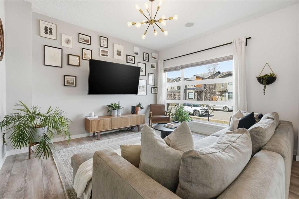 45 Copperpond Avenue Se, Calgary, AB - Indoor Photo Showing Living Room