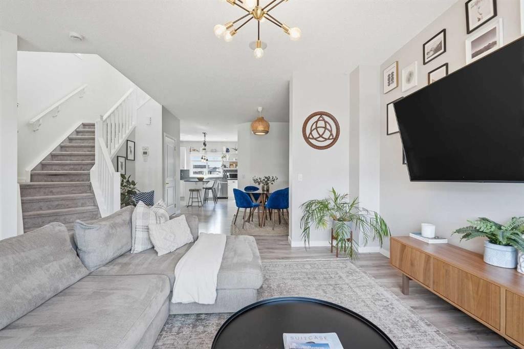 45 Copperpond Avenue Se, Calgary, AB - Indoor Photo Showing Living Room