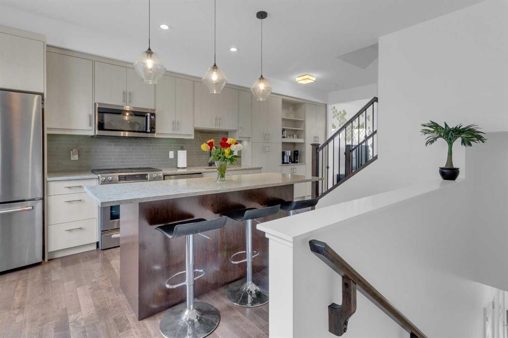 424 Quarry Way Se, Calgary, AB - Indoor Photo Showing Kitchen With Stainless Steel Kitchen With Upgraded Kitchen