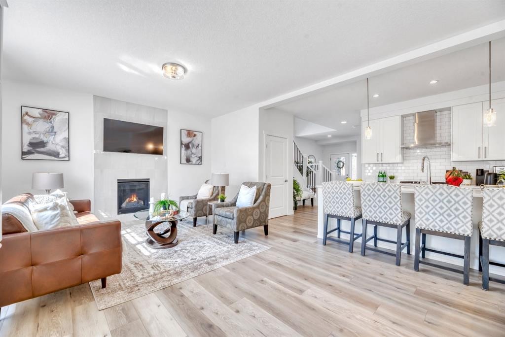 485 Legacy Boulevard Se, Calgary, AB - Indoor Photo Showing Living Room With Fireplace
