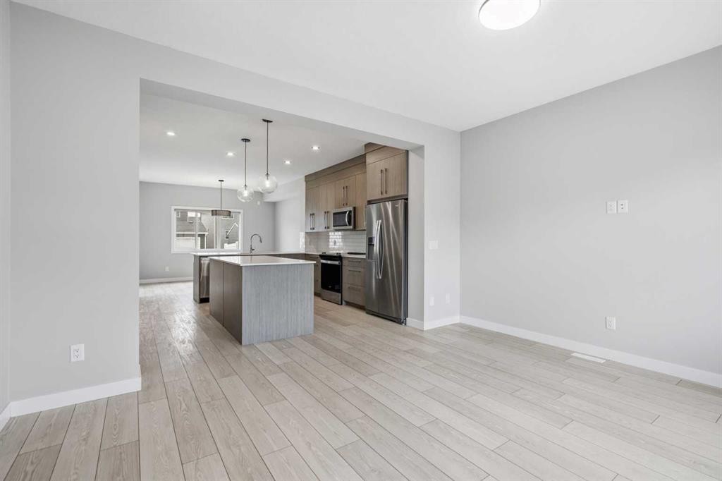 592 Dawson Drive, Chestermere, AB - Indoor Photo Showing Kitchen With Stainless Steel Kitchen