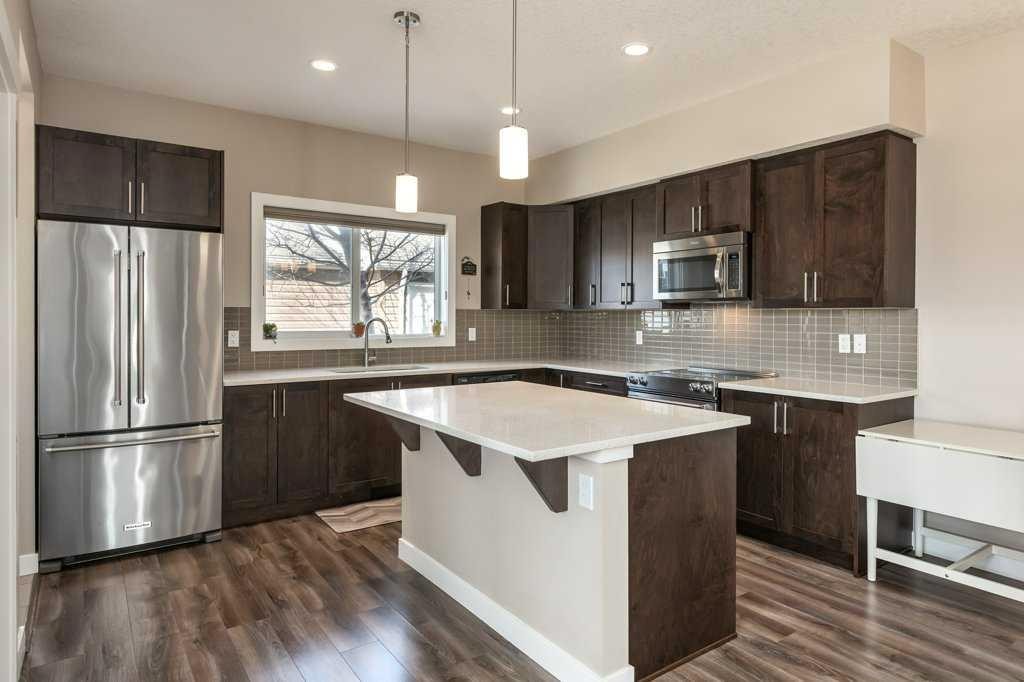 705 Nolan Hill Boulevard Nw, Calgary, AB - Indoor Photo Showing Kitchen With Stainless Steel Kitchen With Upgraded Kitchen
