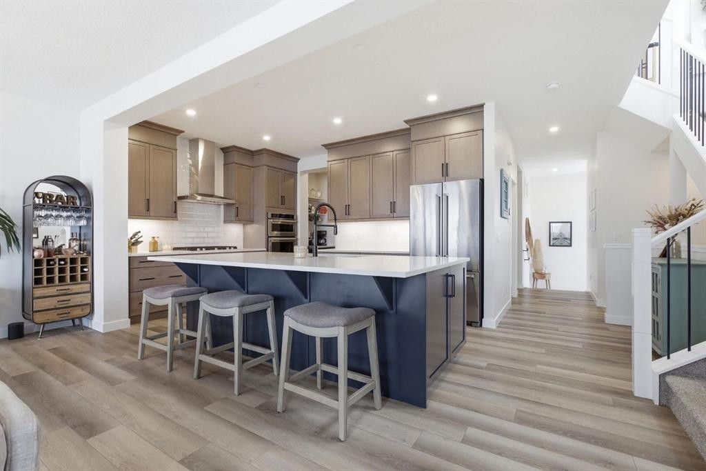 3 Sundown Crescent, Cochrane, AB - Indoor Photo Showing Kitchen With Upgraded Kitchen