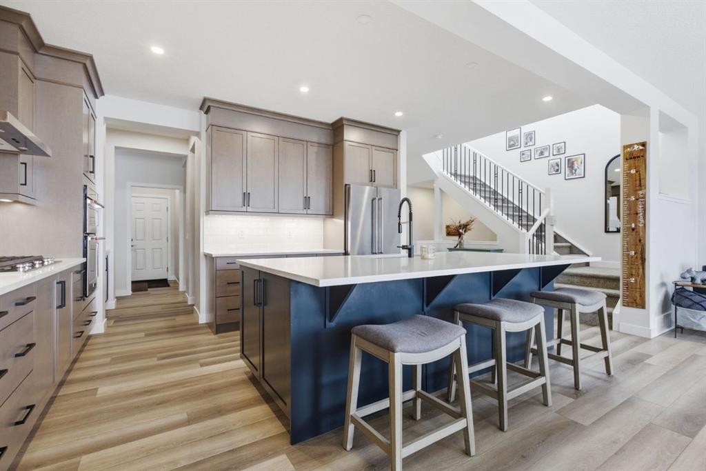 3 Sundown Crescent, Cochrane, AB - Indoor Photo Showing Kitchen With Upgraded Kitchen