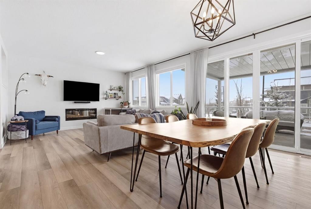 3 Sundown Crescent, Cochrane, AB - Indoor With Fireplace