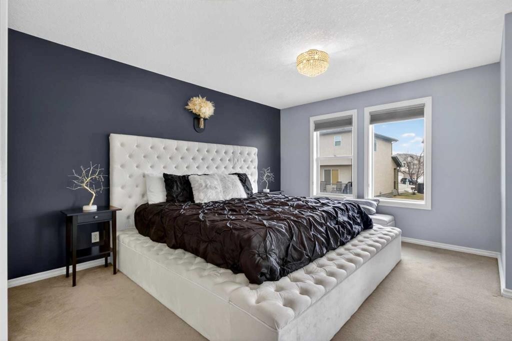 216 Royal Crest View Nw, Calgary, AB - Indoor Photo Showing Bedroom