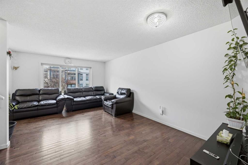 98 Panatella Hill Nw, Calgary, AB - Indoor Photo Showing Living Room