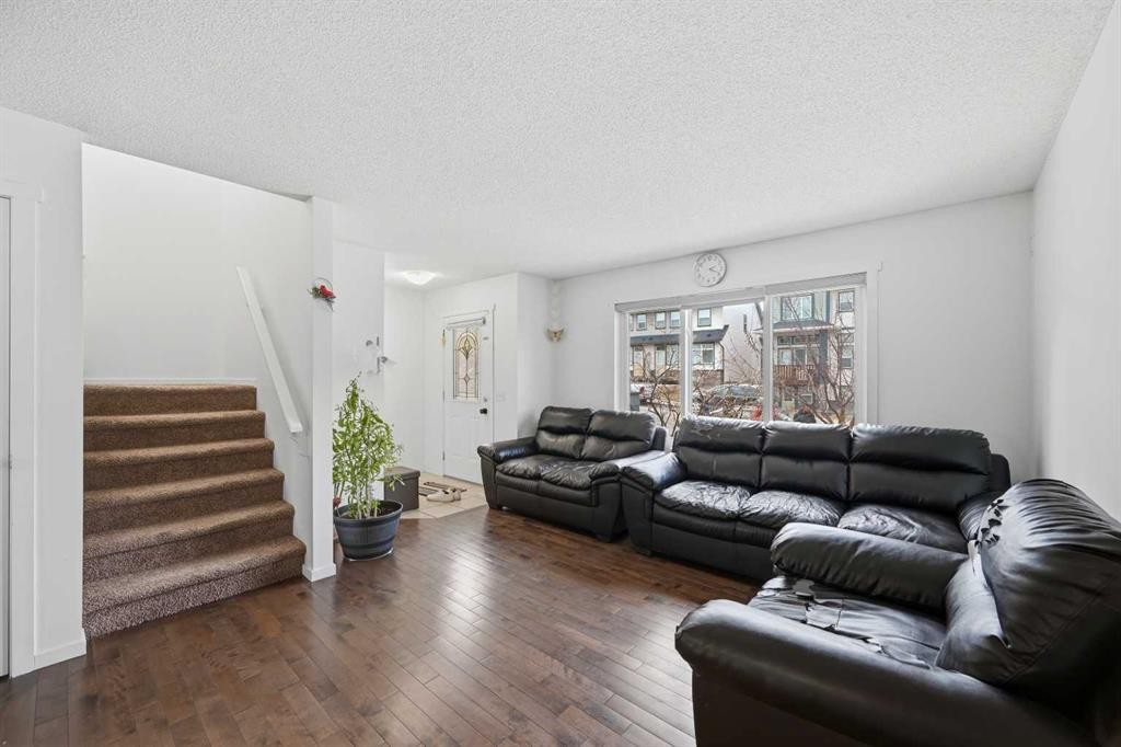 98 Panatella Hill Nw, Calgary, AB - Indoor Photo Showing Living Room
