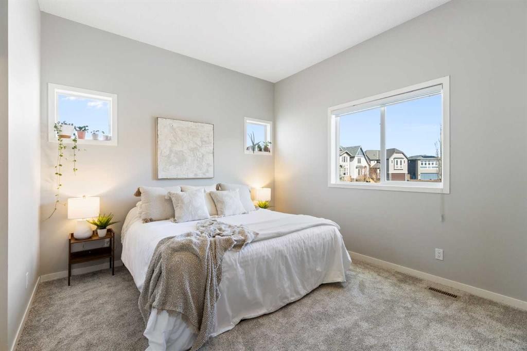 44 Marquis Link Se, Calgary, AB - Indoor Photo Showing Bedroom
