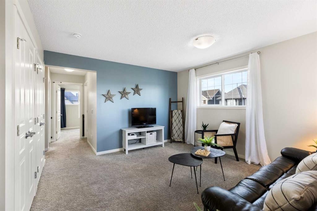 44 Marquis Link Se, Calgary, AB - Indoor Photo Showing Living Room