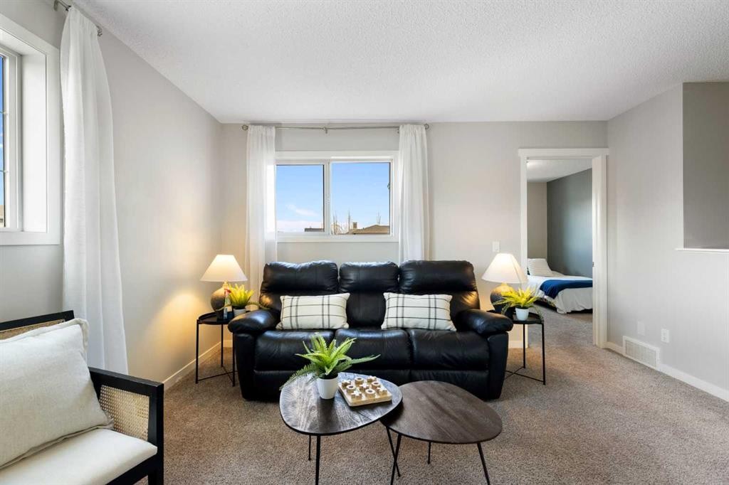 44 Marquis Link Se, Calgary, AB - Indoor Photo Showing Living Room