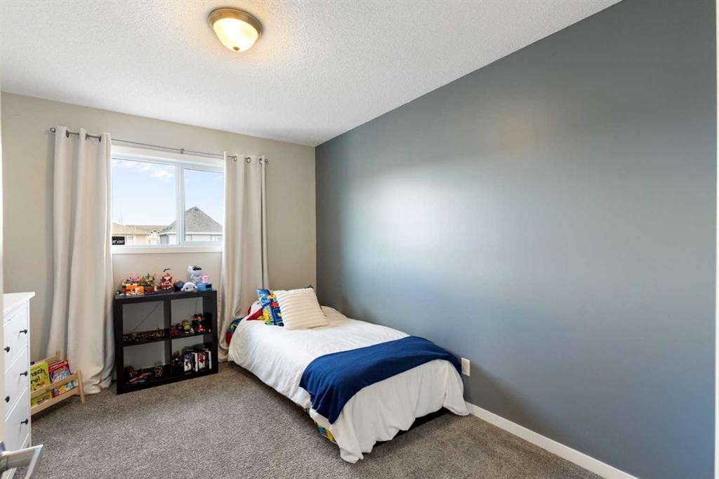 44 Marquis Link Se, Calgary, AB - Indoor Photo Showing Bedroom