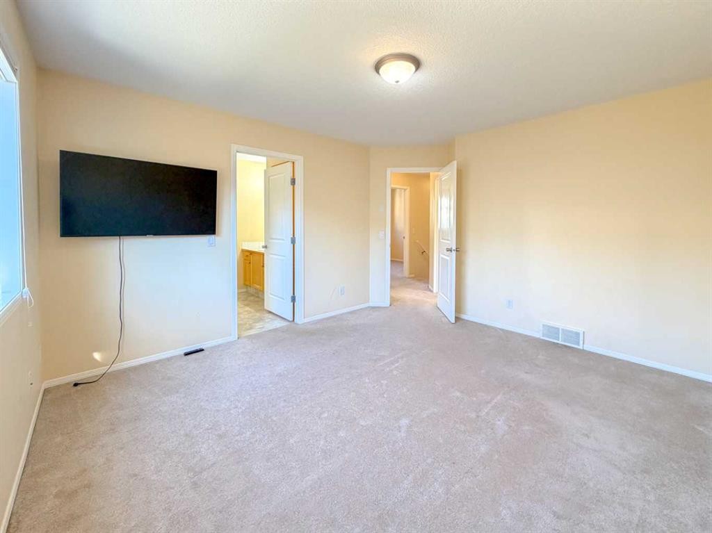 21 Panamount Hill Nw, Calgary, AB - Indoor Photo Showing Other Room