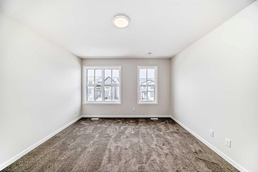 1069 Sawgrass Link Nw, Airdrie, AB - Indoor Photo Showing Other Room