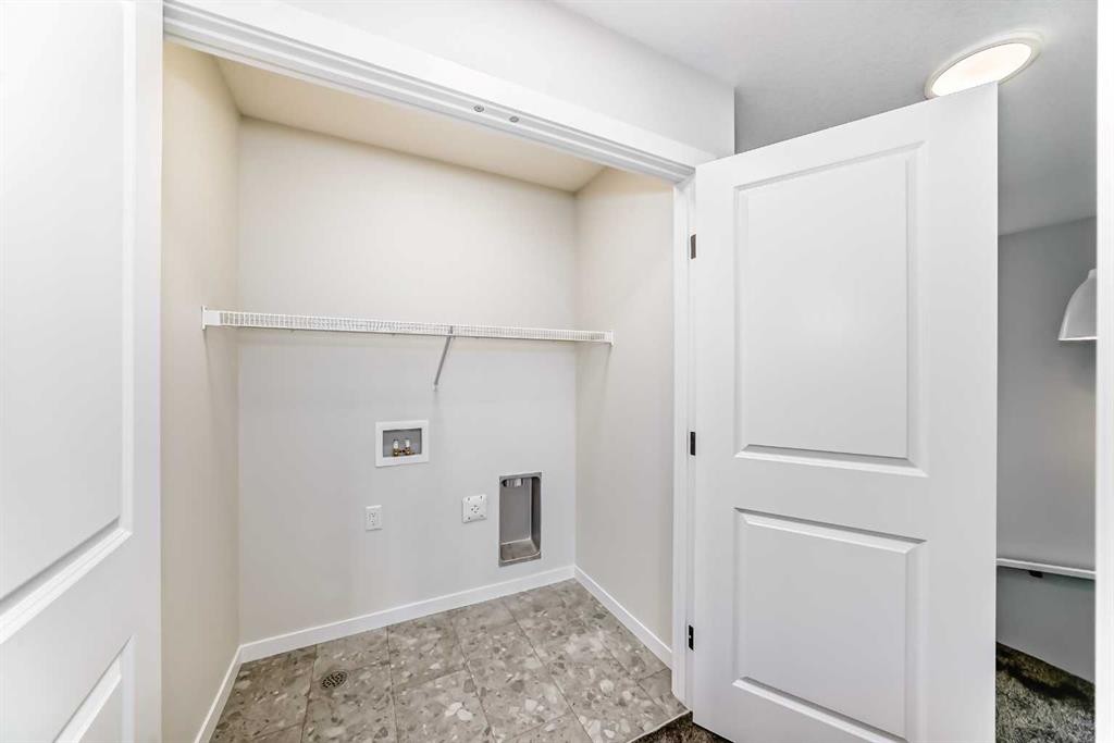 1069 Sawgrass Link Nw, Airdrie, AB - Indoor Photo Showing Other Room