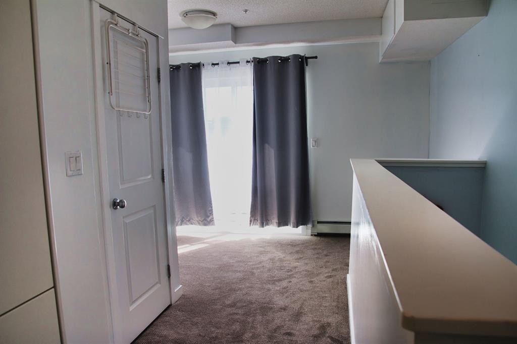 112-1740 9 Street Nw, Calgary, AB - Indoor Photo Showing Other Room