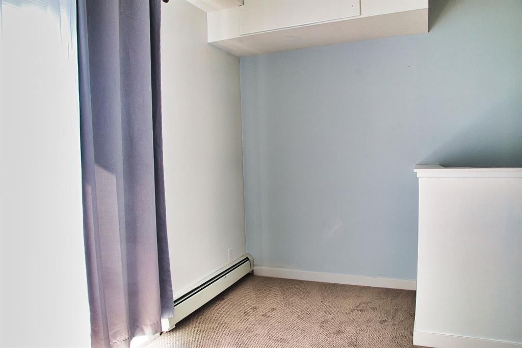 112-1740 9 Street Nw, Calgary, AB - Indoor Photo Showing Other Room