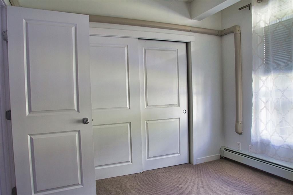 112-1740 9 Street Nw, Calgary, AB - Indoor Photo Showing Other Room