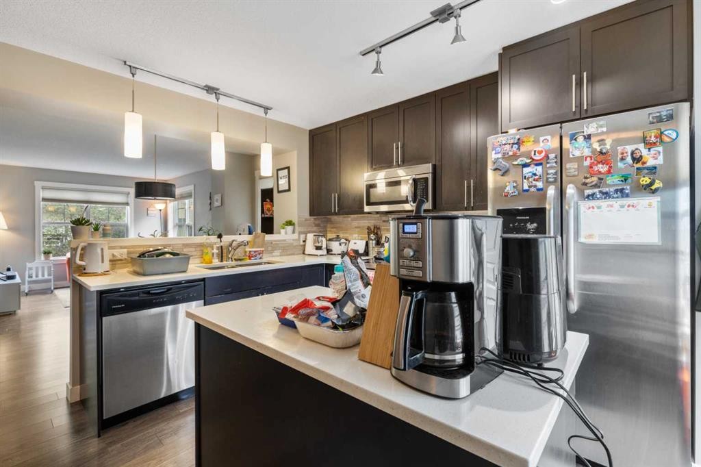 319 Mckenzie Towne Square Se, Calgary, AB - Indoor Photo Showing Kitchen With Stainless Steel Kitchen With Upgraded Kitchen