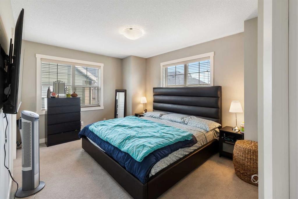 319 Mckenzie Towne Square Se, Calgary, AB - Indoor Photo Showing Bedroom