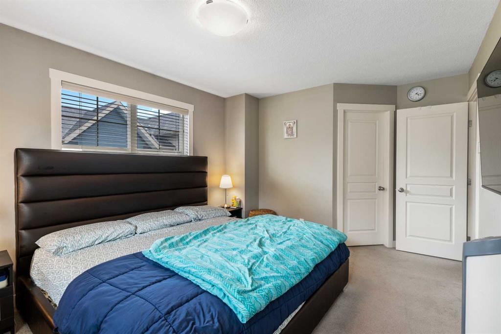 319 Mckenzie Towne Square Se, Calgary, AB - Indoor Photo Showing Bedroom
