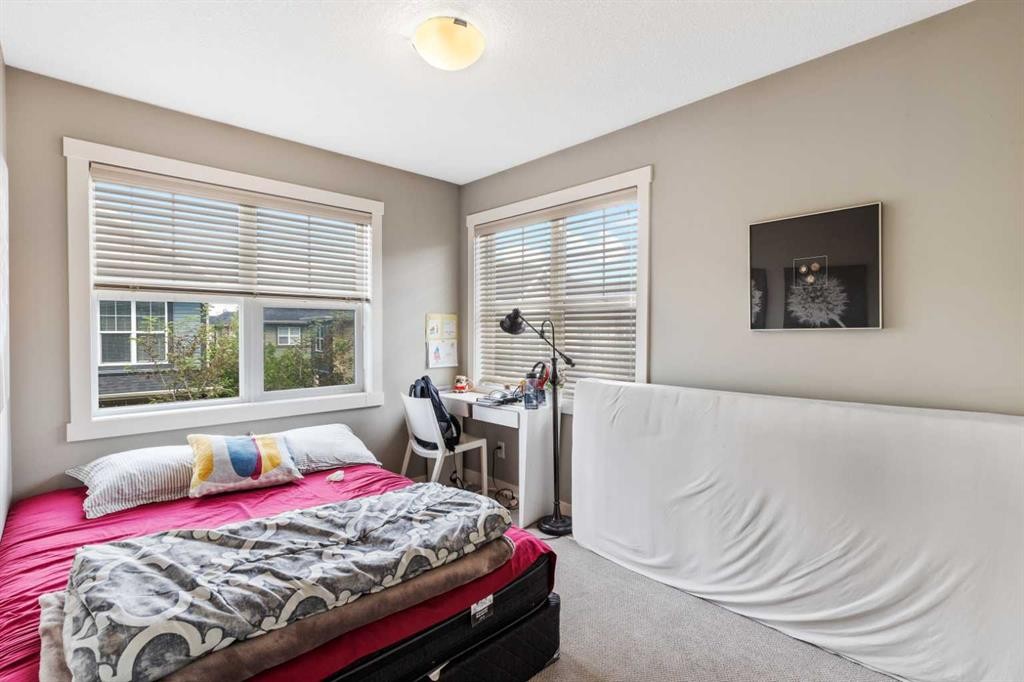 319 Mckenzie Towne Square Se, Calgary, AB - Indoor Photo Showing Bedroom