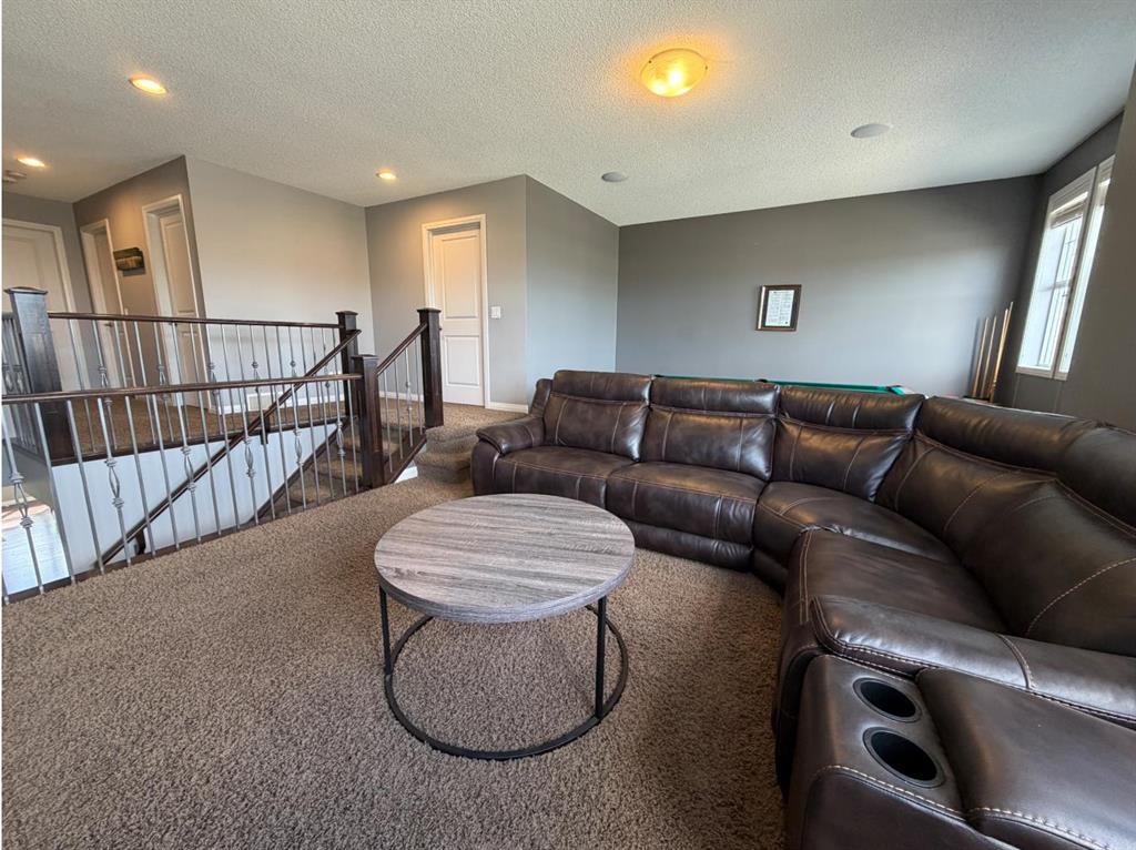 119 Auburn Bay Avenue Se, Calgary, AB - Indoor Photo Showing Living Room