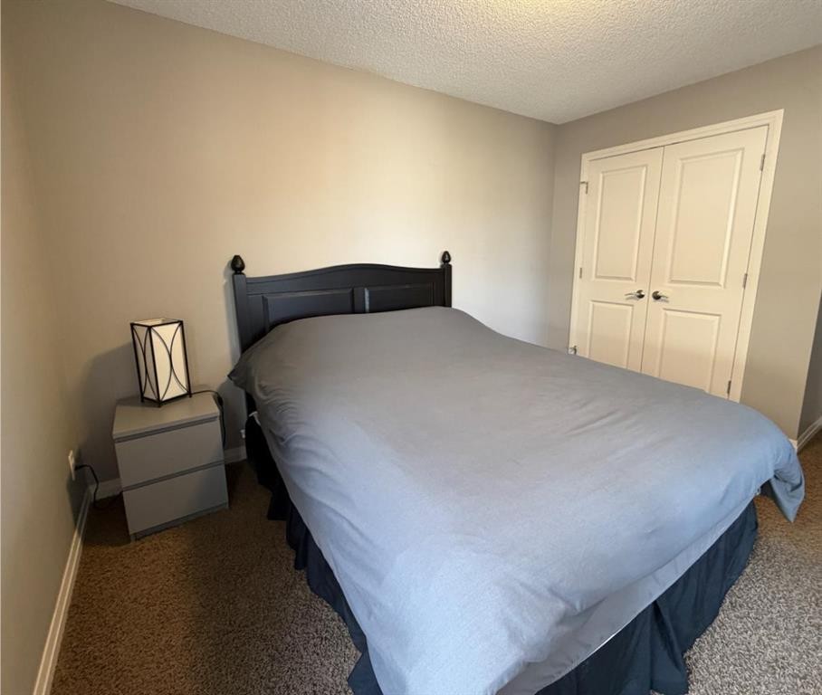 119 Auburn Bay Avenue Se, Calgary, AB - Indoor Photo Showing Bedroom