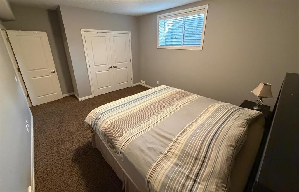 119 Auburn Bay Avenue Se, Calgary, AB - Indoor Photo Showing Bedroom