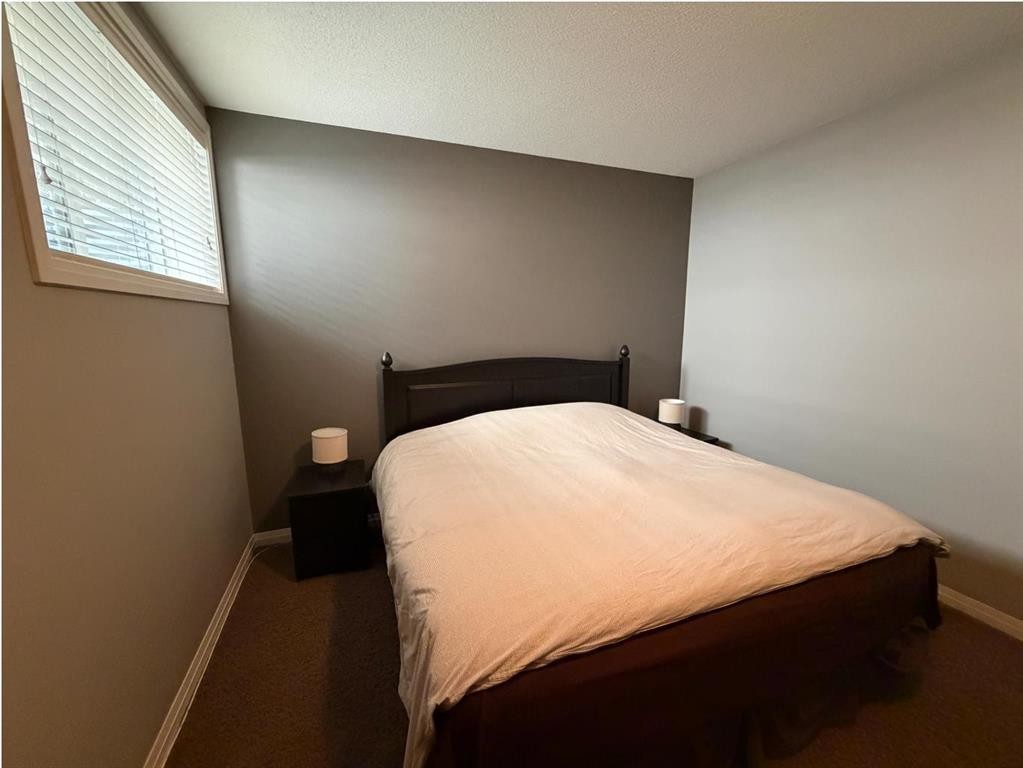119 Auburn Bay Avenue Se, Calgary, AB - Indoor Photo Showing Bedroom