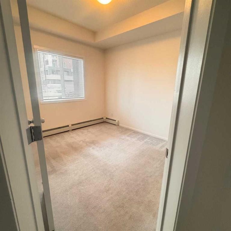2105-4641 128 Avenue Ne, Calgary, AB - Indoor Photo Showing Other Room