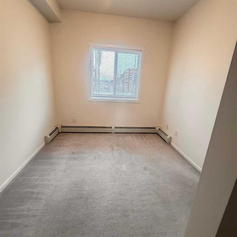 2105-4641 128 Avenue Ne, Calgary, AB - Indoor Photo Showing Other Room