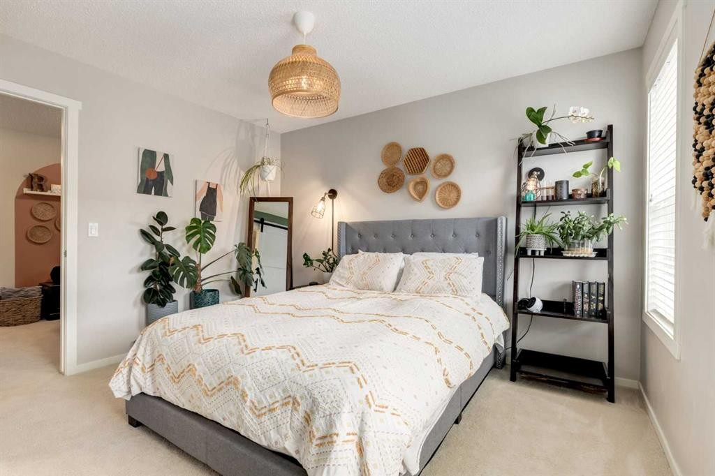 38 Legacy Boulevard Se, Calgary, AB - Indoor Photo Showing Bedroom