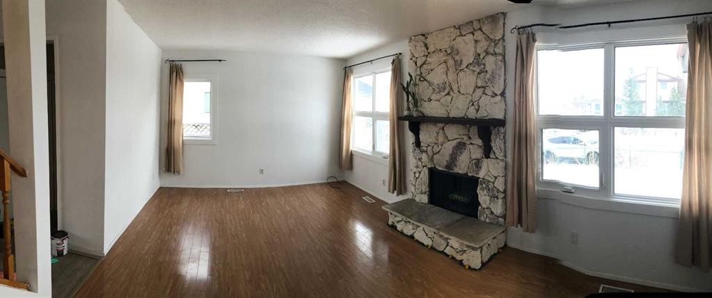 22 Whitman Close Ne, Calgary, AB - Indoor With Fireplace