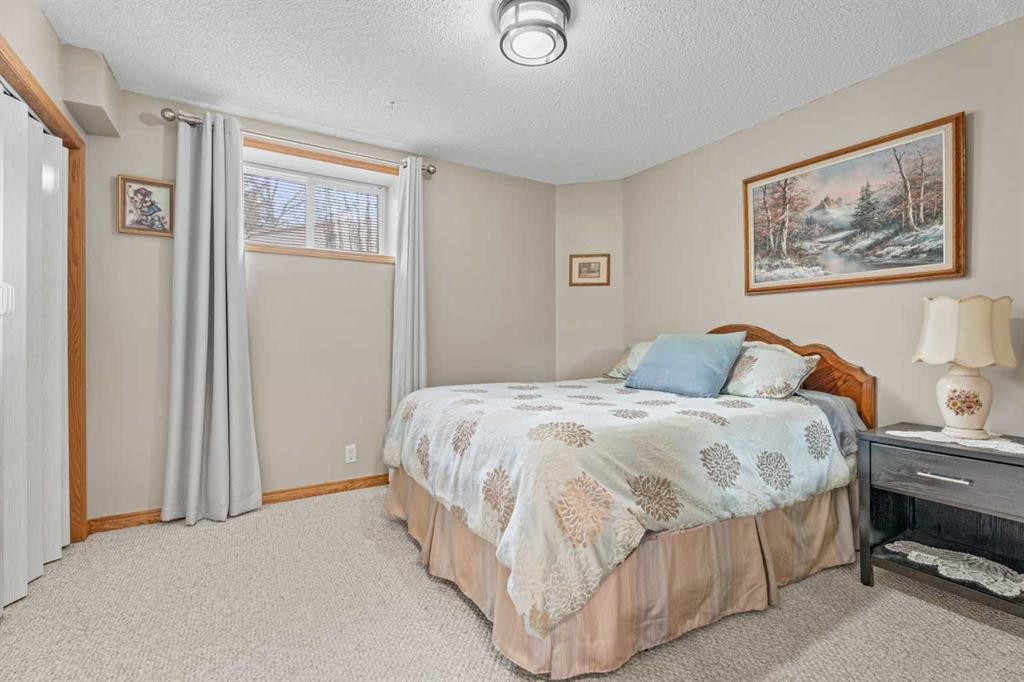 30 Cranston Place Se, Calgary, AB - Indoor Photo Showing Bedroom